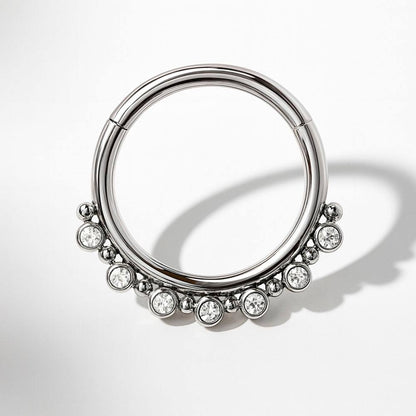 Tytanowy clicker z białymi cyrkoniami i kuleczkami